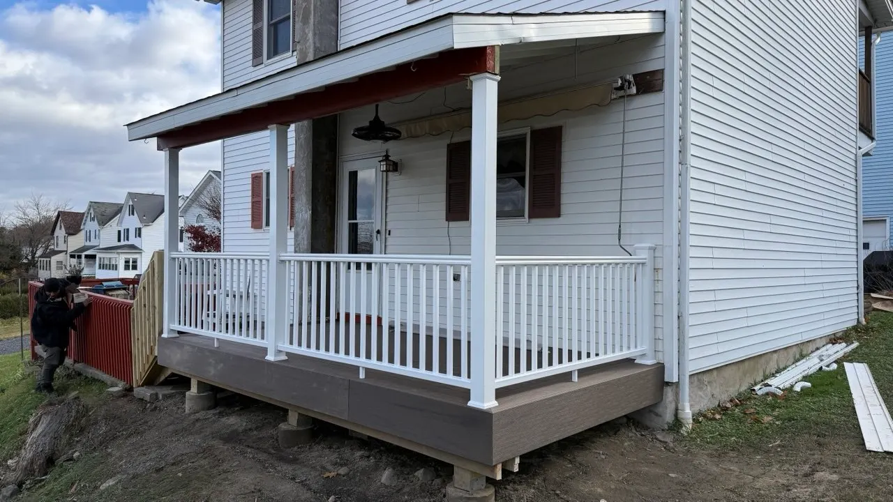 Covered porch with white columns